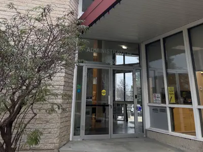 A photo outside the door of the Administration wing at Steinbach City Hall